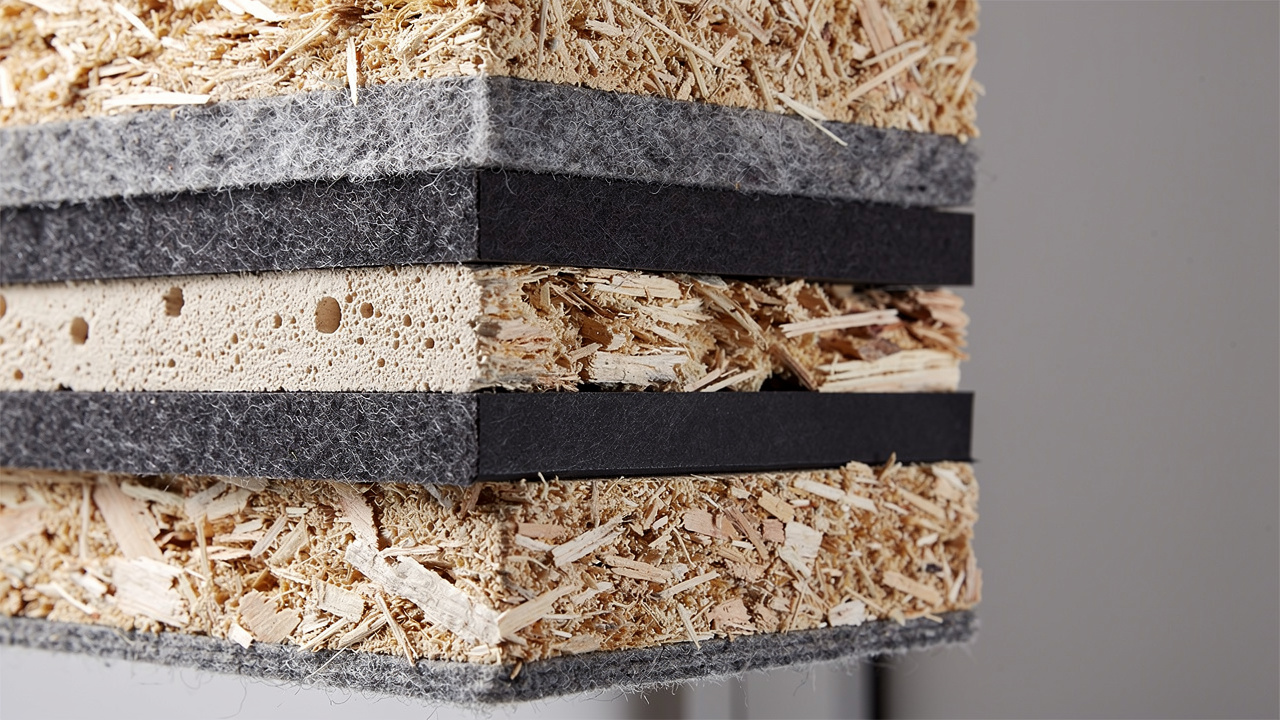 Layered acoustic panels inside office pod wall construction