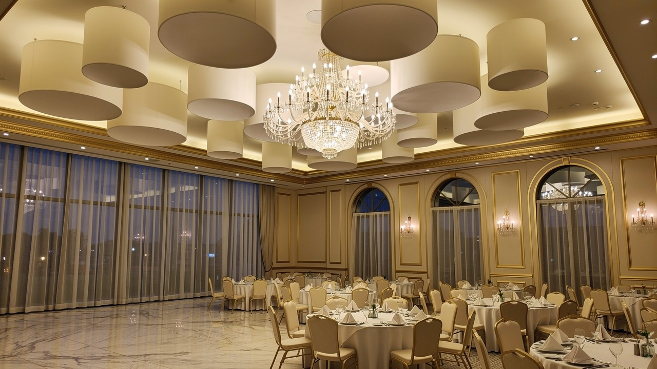 Hotel ballroom with suspended fiberglass acoustic ceiling clouds