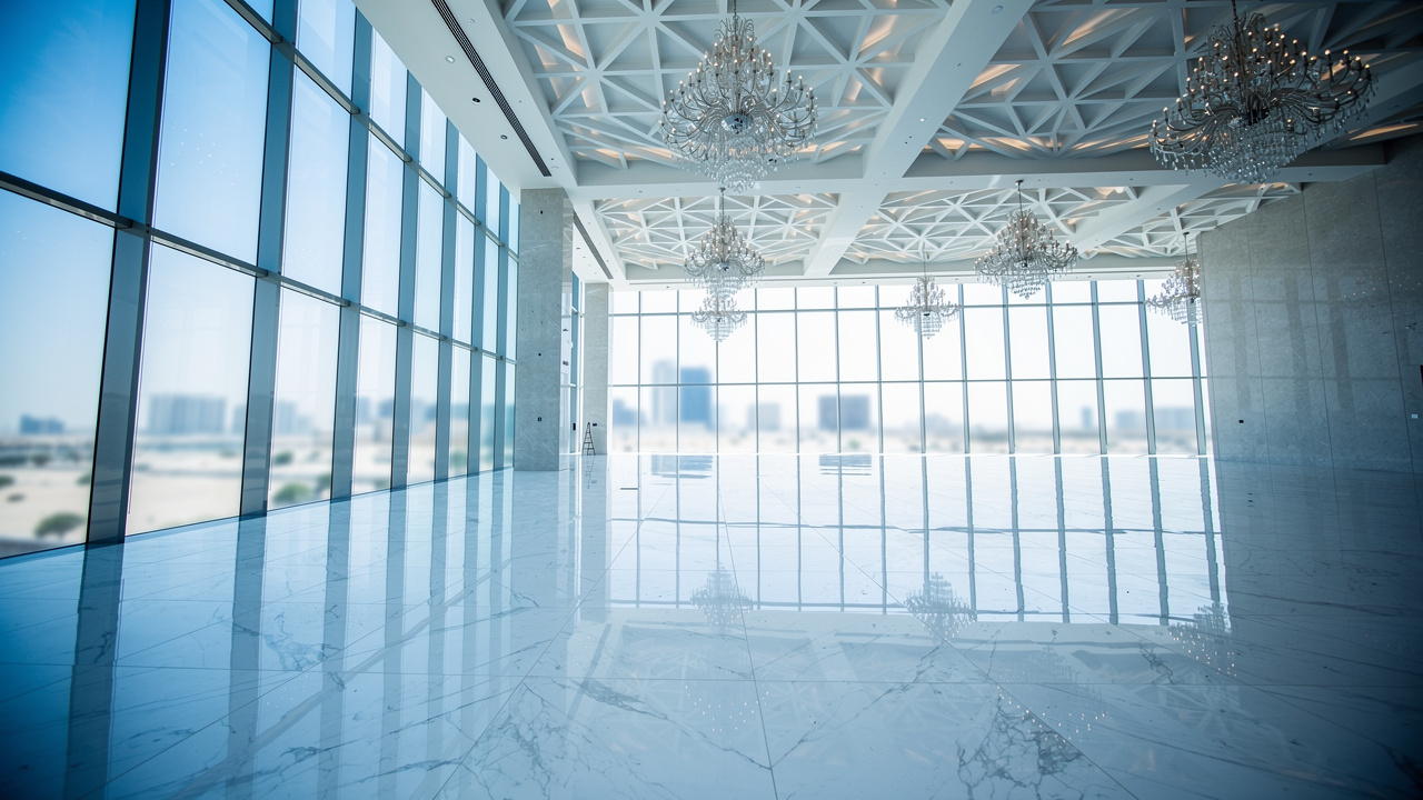 Kuwait luxury hotel lobby with marble floors and glass surfaces